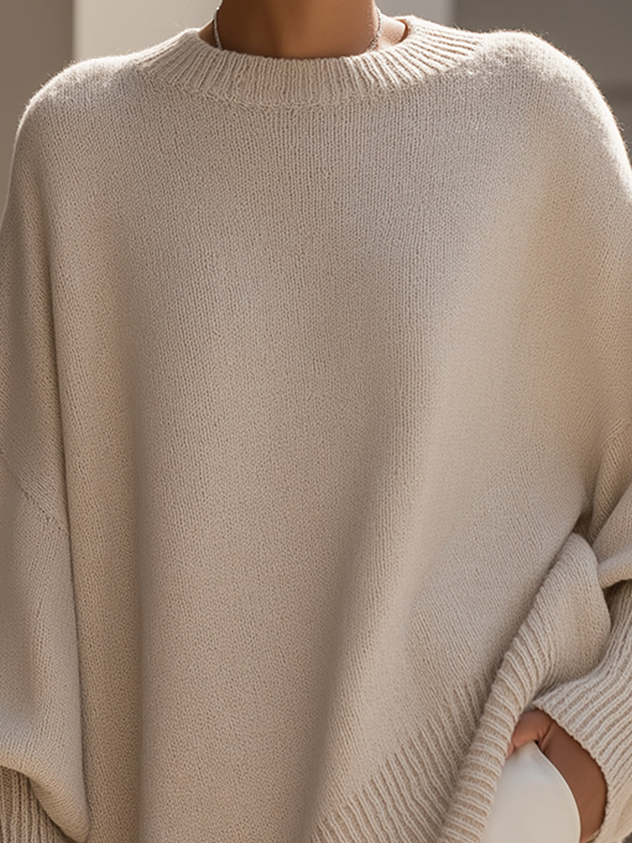 Damski sweter oversize z asymetrycznym dołem
