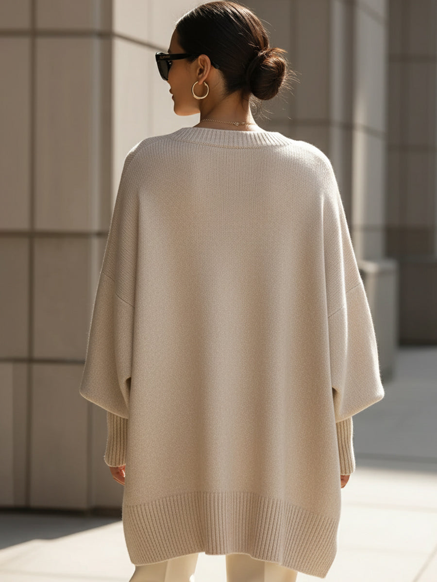 Damski sweter oversize z asymetrycznym dołem