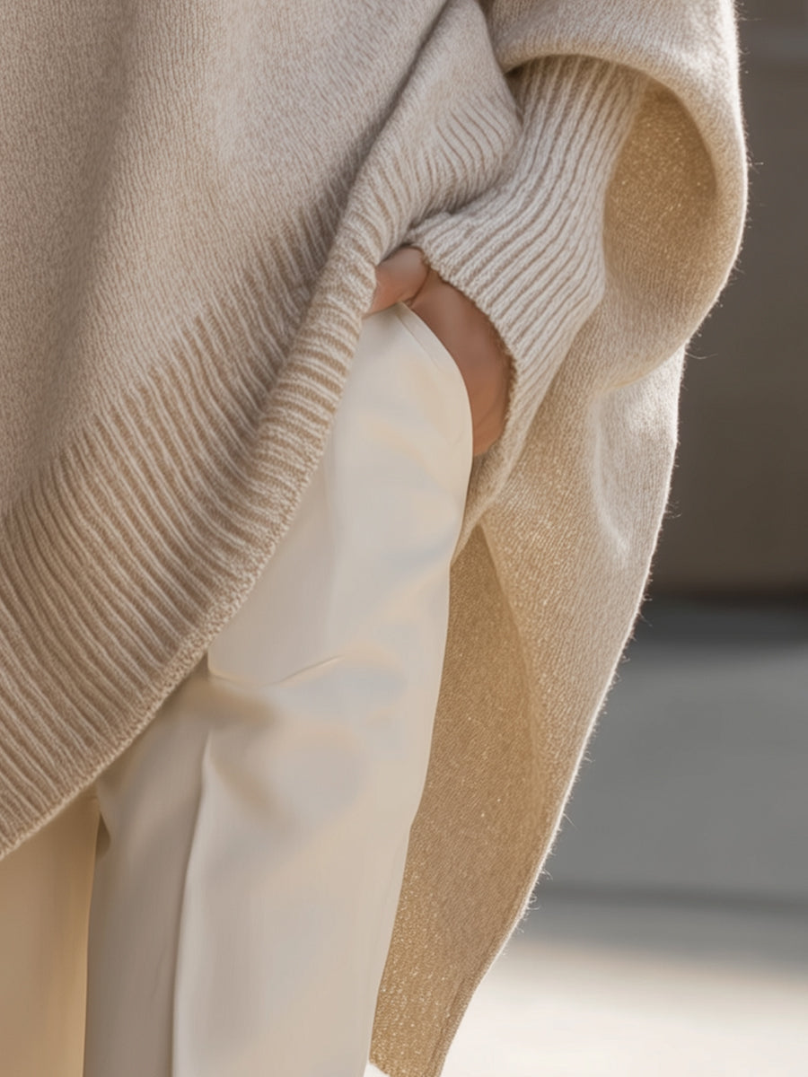 Damski sweter oversize z asymetrycznym dołem